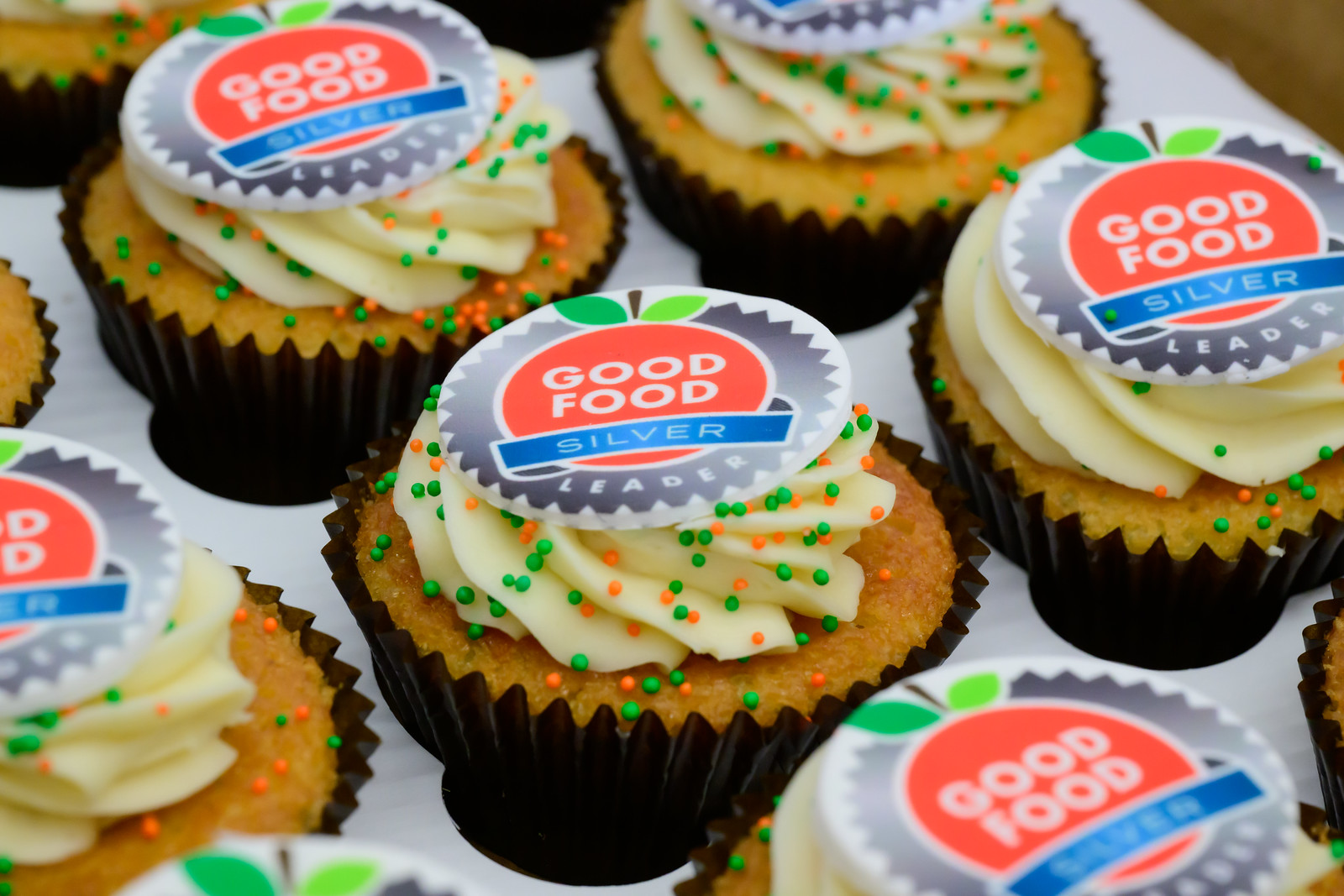 Cupcakes with Good Food Leader: Silver seal on them